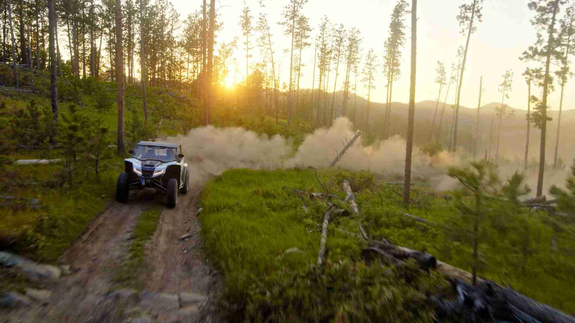 A person riding an ATV outdoors